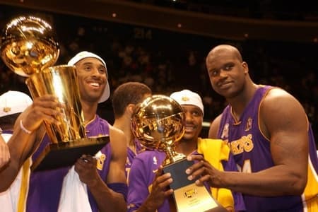 Shaq with NBA trophy know his net worth